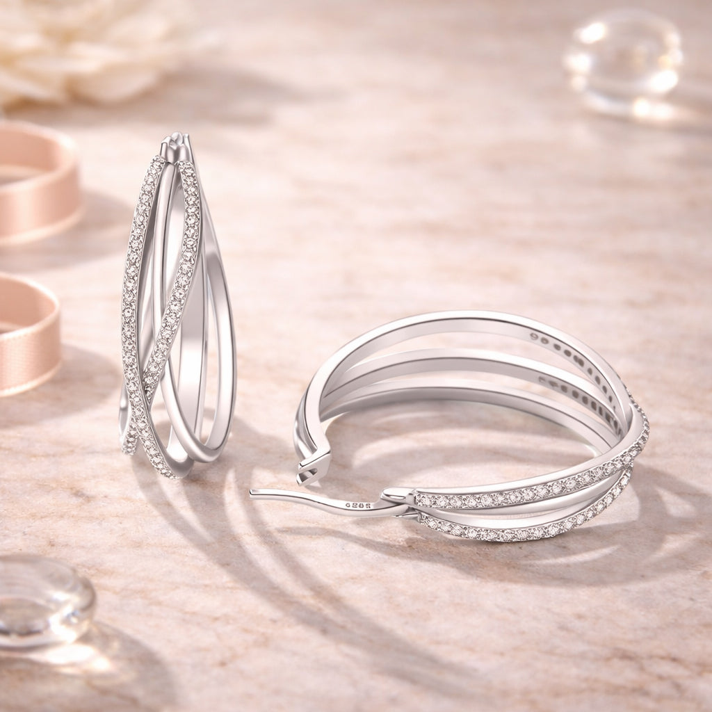 Ohrringe aus 925er Sterling-Silber, Creolen geflochten mit Zirkonia