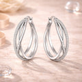 Ohrringe aus 925er Sterling-Silber, Creolen geflochten mit Zirkonia
