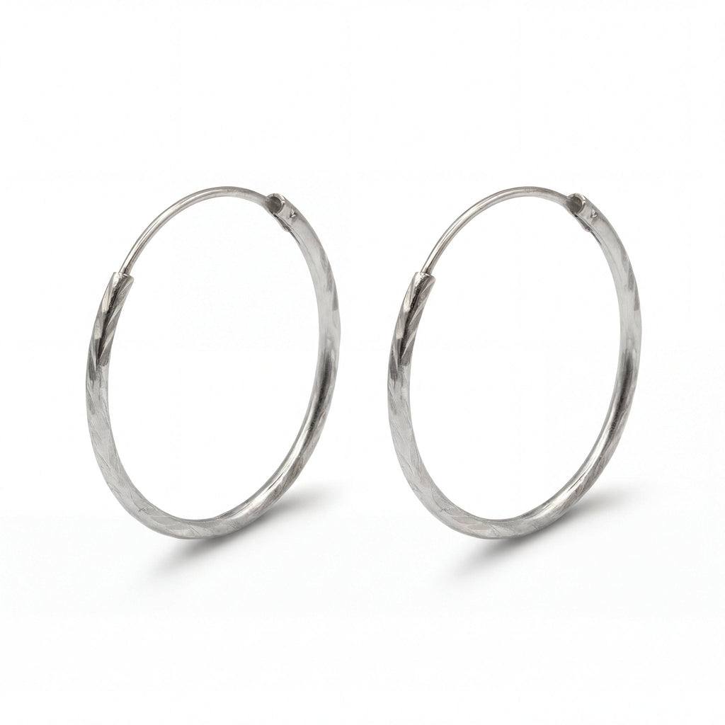 Luma Creolen mit diamond cut