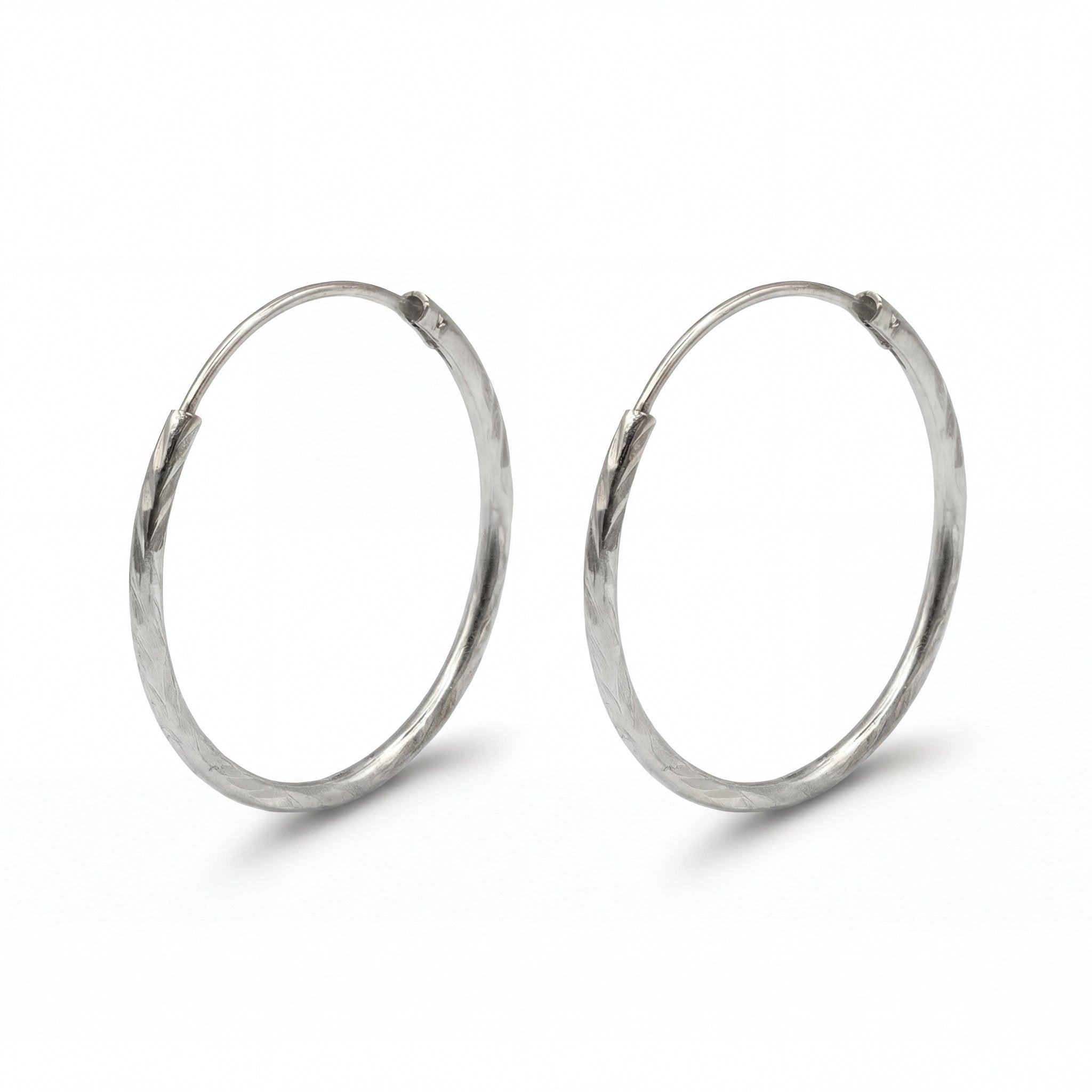 Luma Creolen mit diamond cut