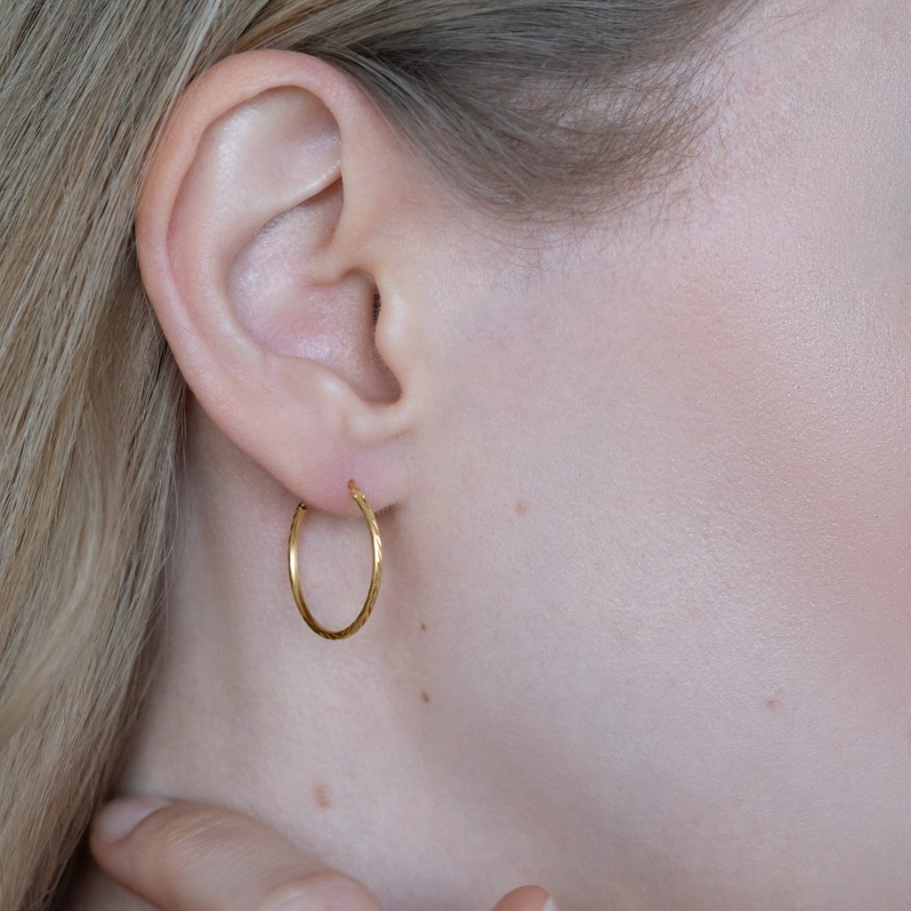 Luma Creolen mit diamond cut